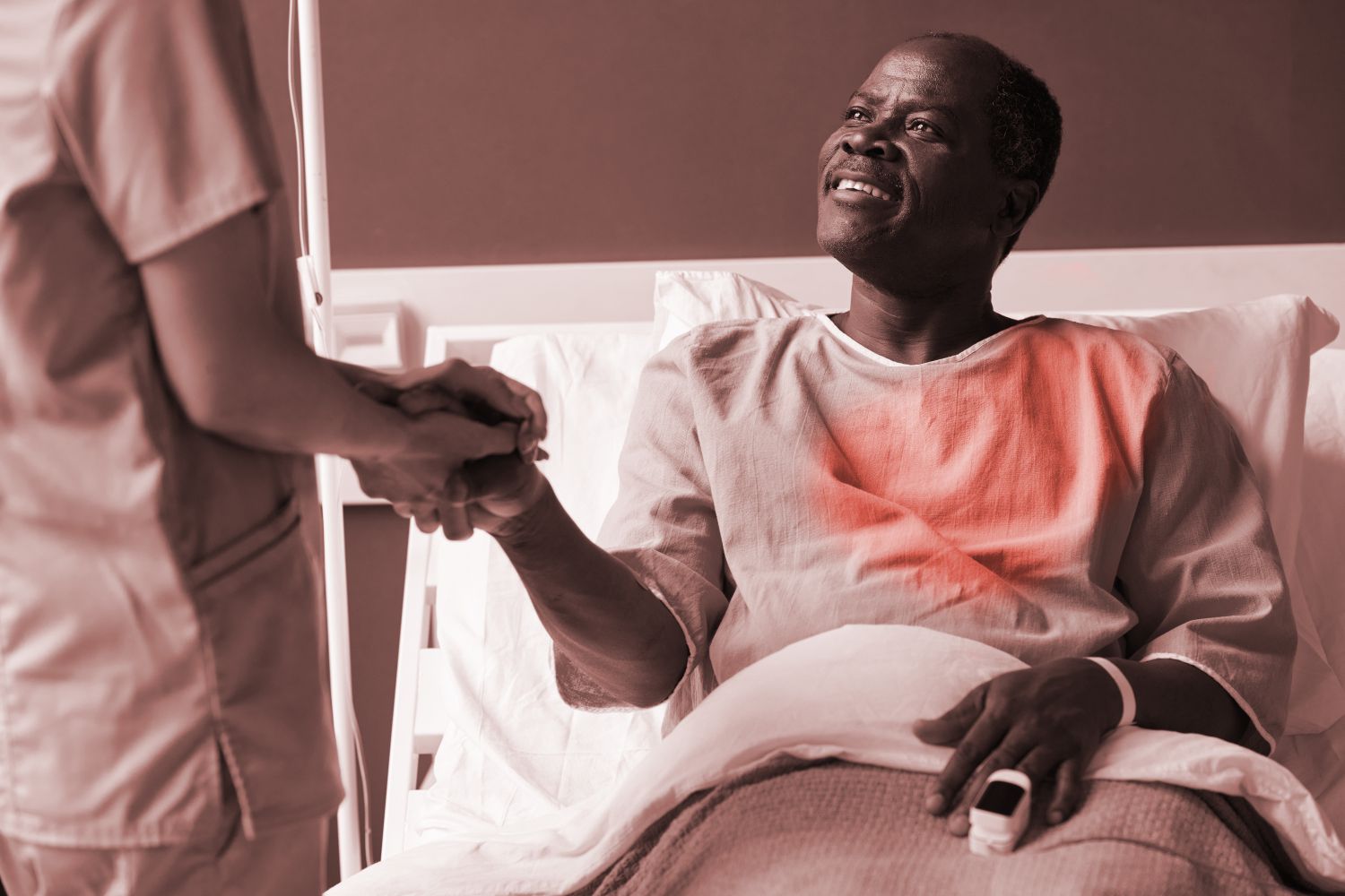 Man in hospital bed with heart disease
