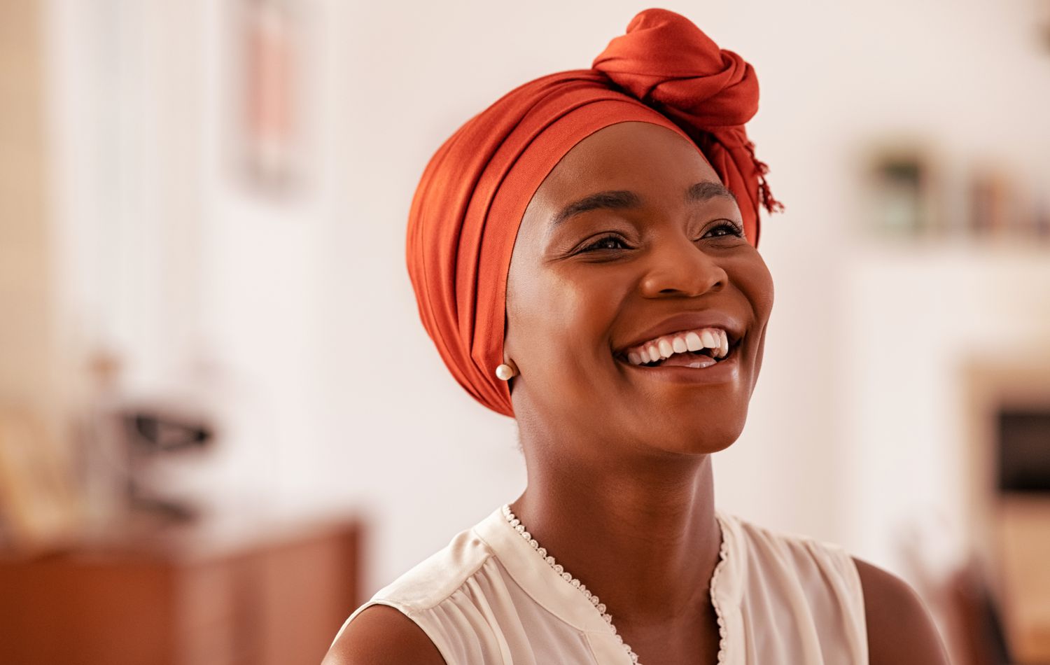 A smiling, healthy-looking woman